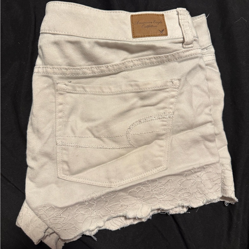 American Eagle white Jean shorts with design